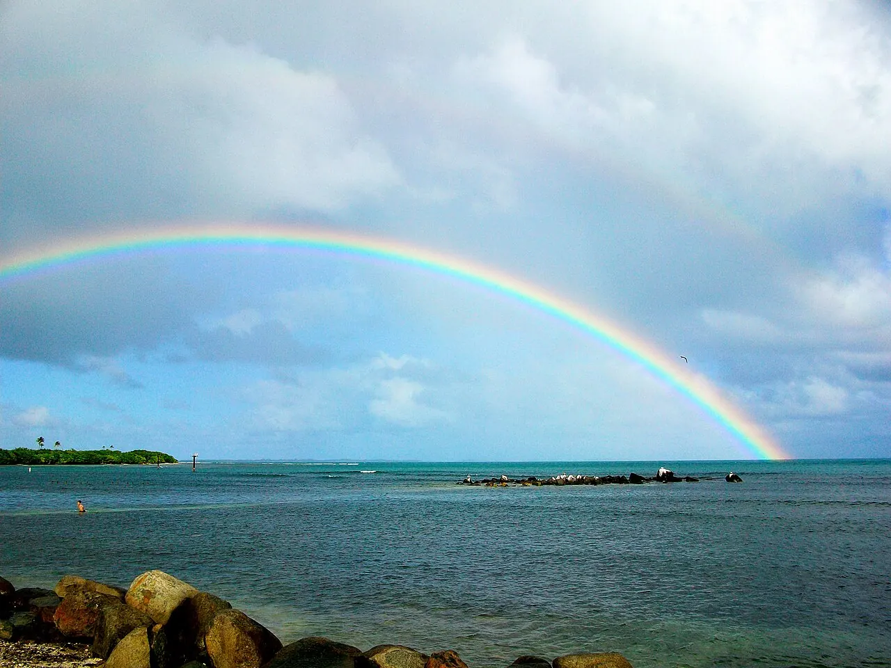 A rainbow over the water at Las Croabas, Fajardo